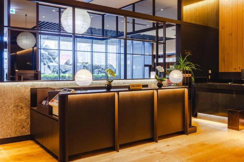 Front desk counter in the lobby of Hotel Gracery Shinjuku